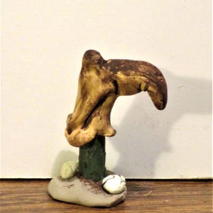 Miniature Old boot on cactus stub