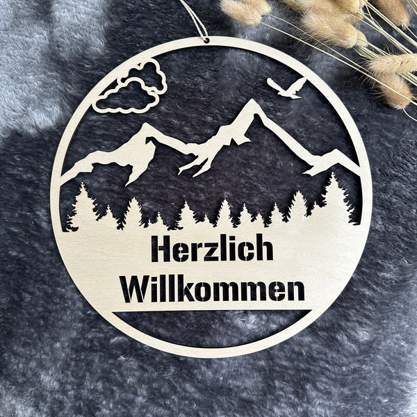 Willkommensschild Berge