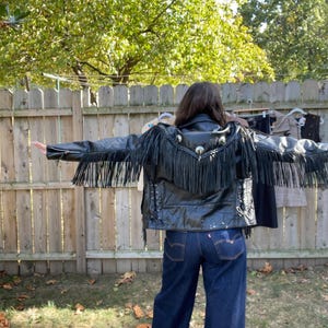 Vintage leather and fringe jacket