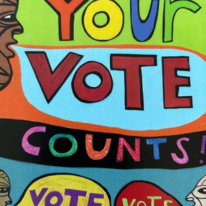 May include: A colorful illustration with the text "Your Vote Counts!" in a bold, cartoonish font. The illustration features three stylized faces with speech bubbles that say "Vote".