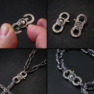 May include: Silver metal jewellery components featuring skull and cross designs. The image shows a clasp, two clasps, and a necklace and bracelet with similar skull and cross details. The jewellery has a gothic or biker theme.
