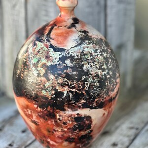 Pitfired 9in tall  wheel thrown bottle
