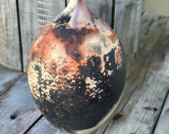 Pitfired 7in tall  wheel thrown bottle