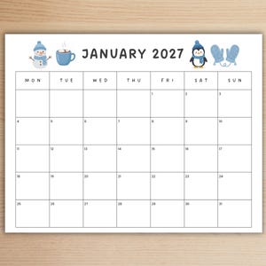 May include: A January 2027 calendar page featuring a grid layout with black text and lines. The header includes illustrations of a snowman, a blue mug, a penguin wearing a blue hat and scarf, and a pair of blue mittens on a white background.