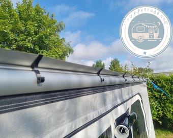 Ganchos para inserción en el eje WIGO en el exterior con función de canaleta de lluvia – juego de 10