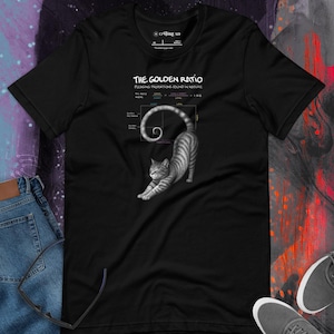 May include: Black t-shirt featuring a gray tabby cat stretching, with a diagram of the golden ratio and the text "THE GOLDEN RATIO". The shirt also has the brand name "O9THREAD" printed at the top.