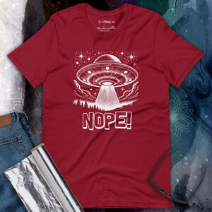 Out of This World NOPE UFO T-Shirt | Funny Alien Ship Abduction Sci-Fi Graphic Tee | Gift for Space Lovers, Stargazers & UFO Enthusiasts