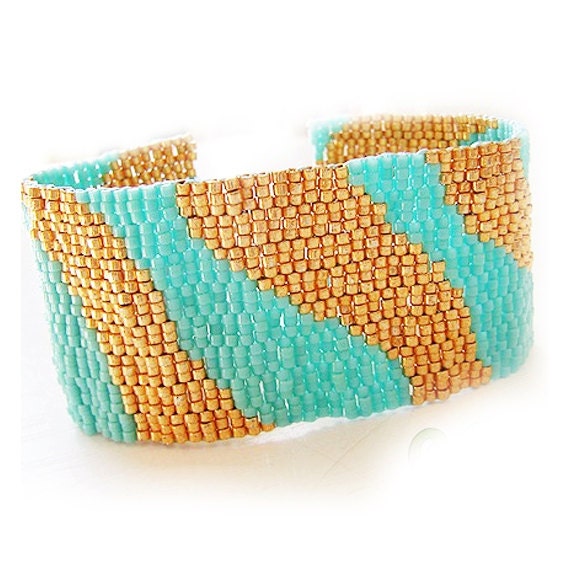 Items similar to Turquoise Blue and Gold Glass Beads Bracelet ...