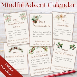 May include: A set of six beige cards with text and botanical illustrations, forming a Mindful Advent Calendar. Each card features a daily prompt for reflection, with titles like "Remember Your Center" and "Permission to Be". A red pen rests at the bottom.