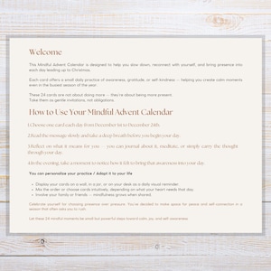 May include: A beige card with text, titled "Welcome" and "How to Use Your Mindful Advent Calendar." The text describes a 24-day mindfulness practice leading up to Christmas, with daily prompts for reflection and awareness.