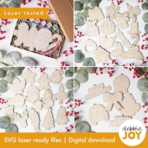 May include: A set of 18 laser-cut wooden Christmas decorations ready for painting. The decorations feature various festive themes, including a snowman, a gingerbread man, a penguin, a Christmas tree, a reindeer, a nutcracker, a ballerina, a snowflake, a bell, a candy cane, a stocking, a wreath, a present, a snow globe, a hot chocolate mug, a jumper, and a "Merry Christmas" banner. The decorations are arranged on a white background with red berries and greenery.