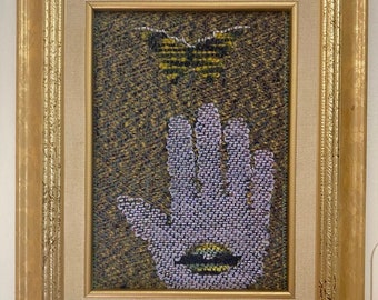 Hand woven small tapestry, “Handle with Care”, by Laura foster Nicholson. Golden frame