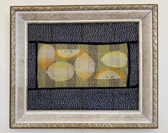 small handwoven tapestry, "Lemonade". Framed