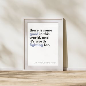 May include: A white framed print with a quote from J.R.R. Tolkien's The Two Towers: "there is some good in this world, and it's worth fighting for."