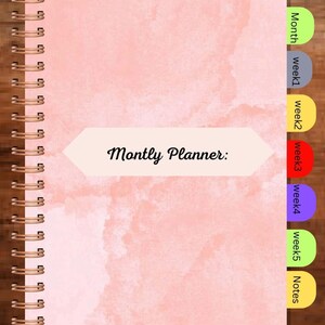May include: A pink monthly planner with a spiral binding and tabs for each week and month. The cover has a watercolor-like design and the words "Monthly Planner" are printed on the front. The tabs are labeled "Month", "Week 1", "Week 2", "Week 3", "Week 4", "Week 5", and "Notes".