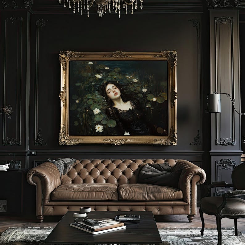 May include: A sophisticated living room with a large framed painting depicting a woman in a pond, above a brown leather Chesterfield sofa. The room has dark walls, a black coffee table, and a chandelier.