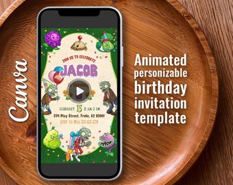 May include: A smartphone displaying a digital birthday invitation template featuring cartoon zombies and plants. The text reads: Join us to celebrate Jacob is turning, February 15 11 AM-2 PM, 234 Play Street, Frolic, AZ 85001, RSVP to Mia 123-123-1234.