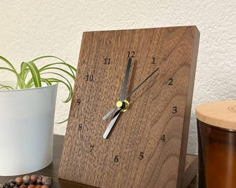 Minimalist silent wooden table clock.