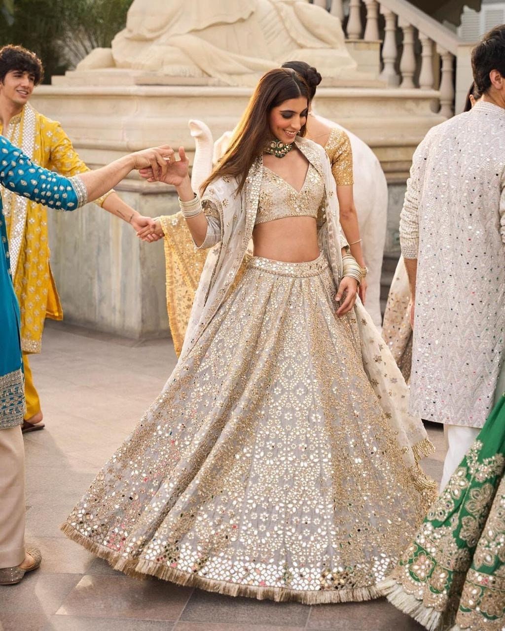 Gold sabyasachi lehenga sale