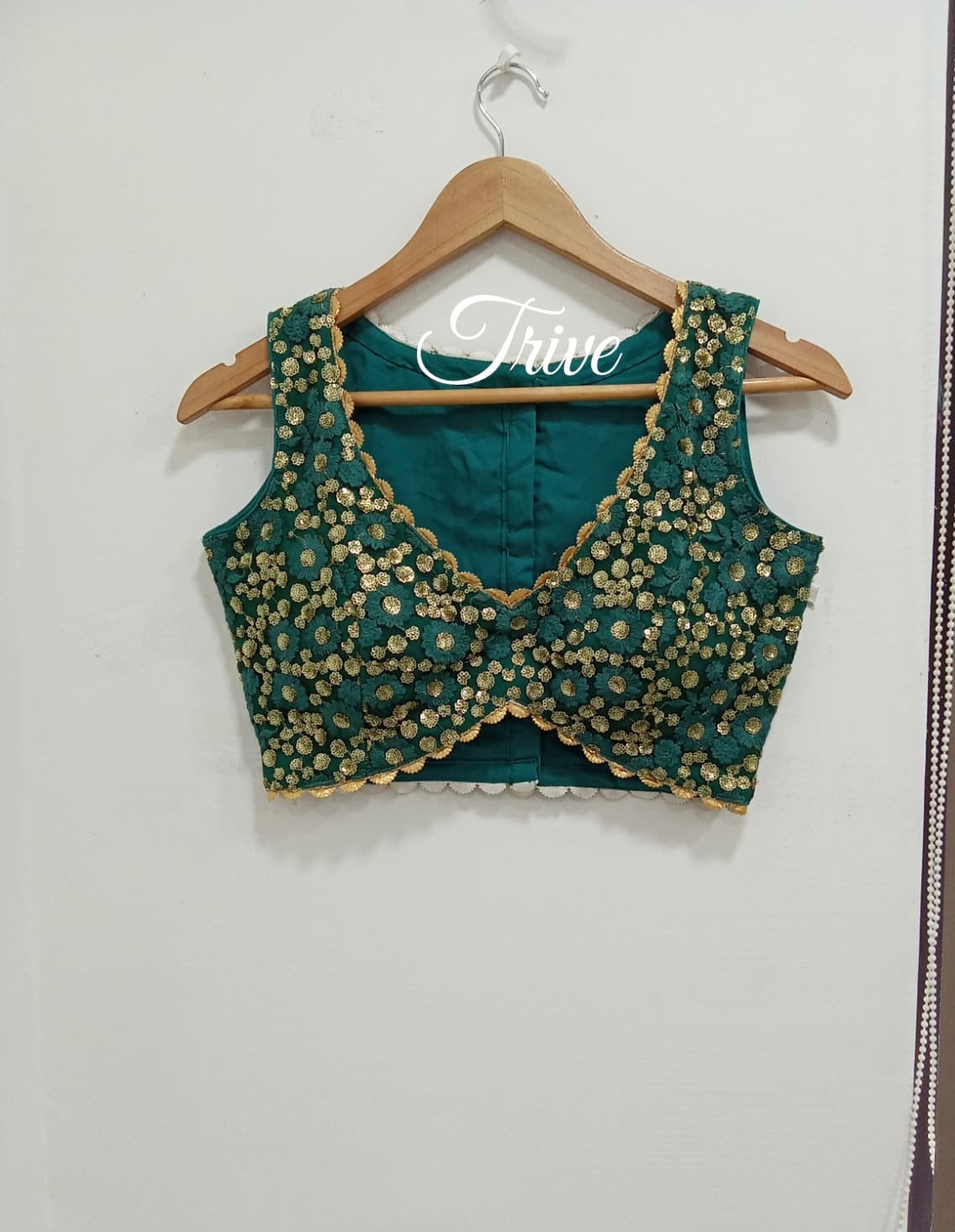 crop top dress blouse design A perfect blend of tradition and freshness This stunning crop top & lehenga set brings together rich hand embroidery on a royal purple blouse with a beautifully pleated green silk lehenga