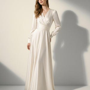 fitted lace wedding dress NISHA Long Sleeve A-Line Lace Gown main image 1