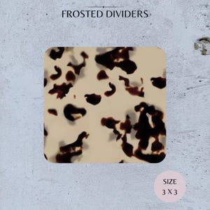 May include: Frosted dividers with a tortoiseshell pattern. The square-shaped divider has rounded corners and a cream background with dark brown spots. The size is 3 x 3 inches.