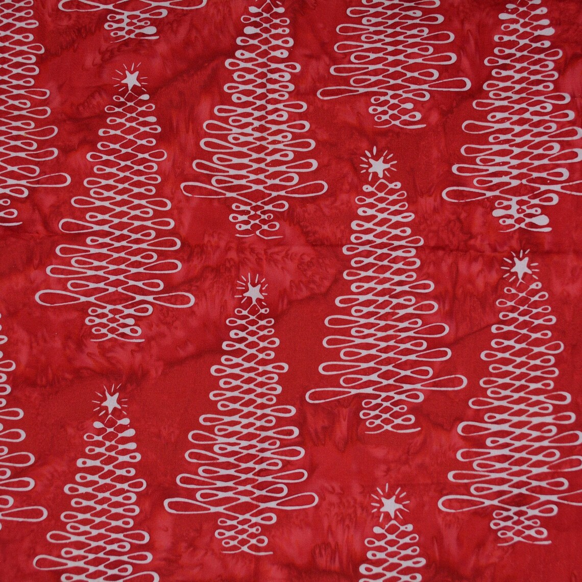 Red batik cotton fabric Christmas trees ribbon swirl | Etsy