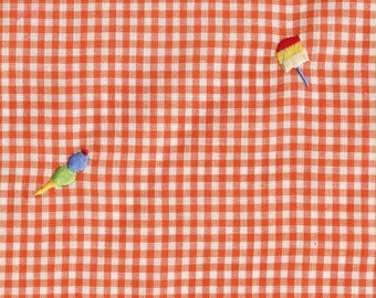 Orange checkered fabric with embroidered ice cream frozen treats