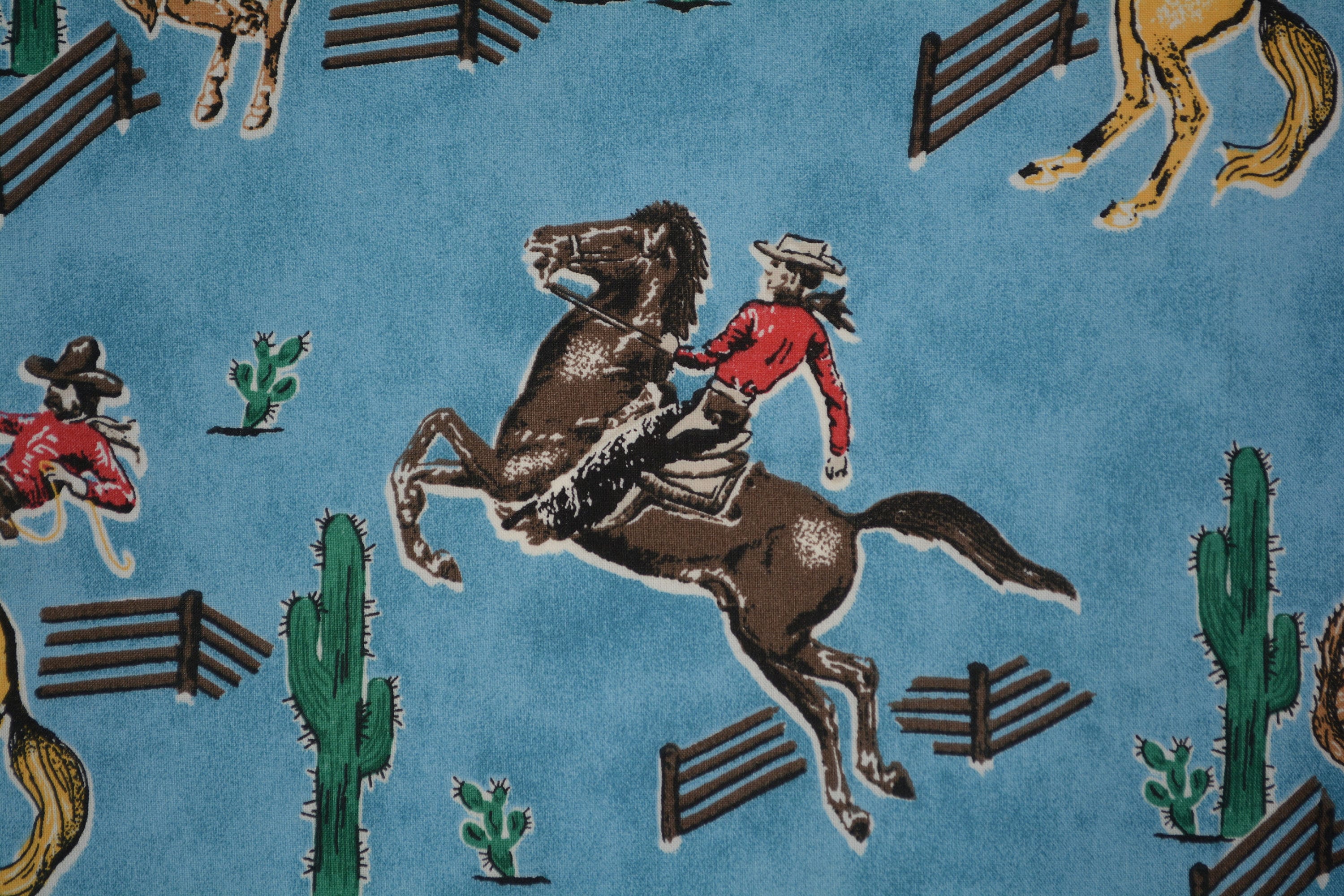 Robert Kaufman Fabrics Designer Green Cowboy on Horse Cotton Print