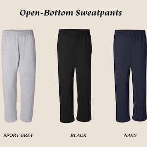 Light gray personalized sweatpants with custom text on the thigh, featuring a relaxed fit and elastic waistband, available in multiple colors.