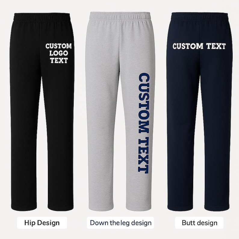 May include: Three pairs of sweatpants in black, gray, and navy blue. Each pair features a different design: custom logo text on the hip, custom text down the leg, and custom text on the butt. The sweatpants have an elastic waistband.