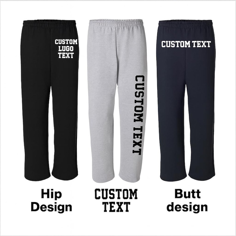 May include: Three pairs of sweatpants in black, gray, and navy blue. Each pair has a different text design: "CUSTOM LUGO TEXT" on the hip, "CUSTOM TEXT" vertically down the leg, and "CUSTOM TEXT" across the butt. The text is in white.