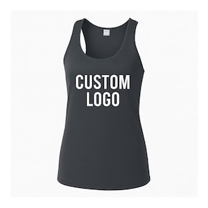 May include: A dark gray tank top with a scoop neck and racerback design. The words "CUSTOM LOGO" are printed in white block letters across the front. This athletic top is suitable for workouts or casual wear.