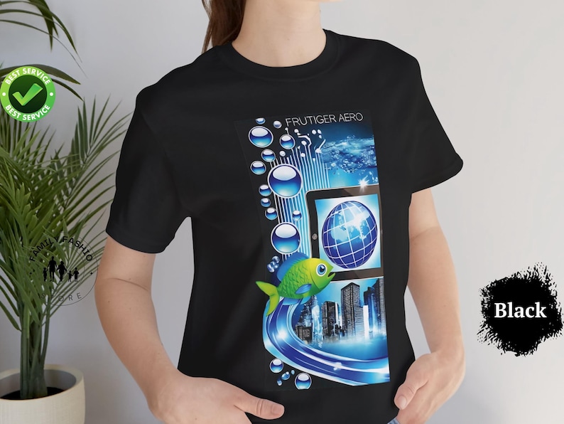 May include: Black t-shirt featuring a vibrant graphic design. The design includes the text "FRUTIGER AERO", a tablet displaying a globe, a cartoon fish, and blue bubbles. The shirt also has a "Best Service" logo.