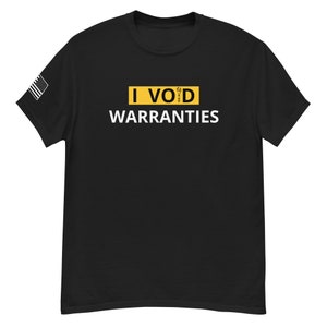 May include: Black t-shirt with a white graphic that says "I VOID WARRANTIES" in a yellow box.
