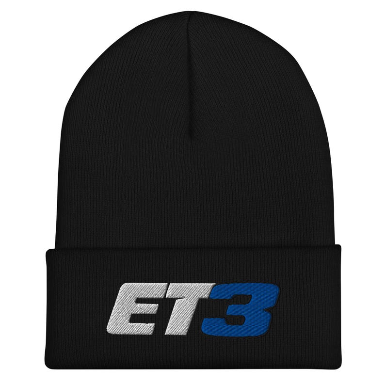 May include: Black beanie with a white and blue embroidered logo that says "ET3".