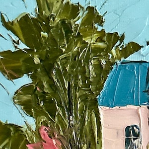 May include: An oil painting on canvas featuring a textured impasto technique. A small house with a light pink facade and a bright blue roof sits beside a large, dark green tree. The background is a solid light blue sky, with small orange flowers.