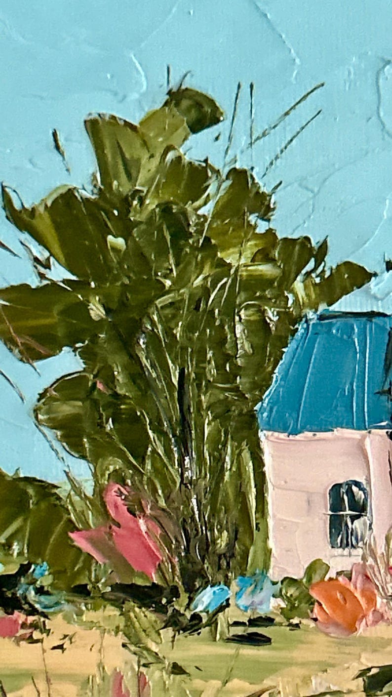 May include: An oil painting on canvas featuring a textured impasto technique. A small house with a light pink facade and a bright blue roof sits beside a large, dark green tree. The background is a solid light blue sky, with small orange flowers.