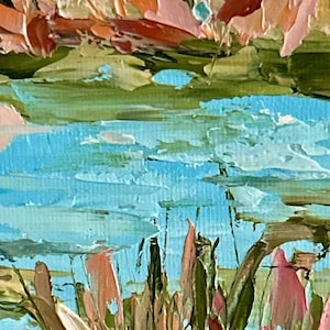 May include: An oil painting on canvas featuring a textured landscape with thick impasto brushstrokes. The scene displays a bright blue body of water surrounded by tall green grasses and foliage in shades of pink, orange, and muted earth tones.