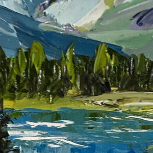 May include: An impressionistic painting of a mountain landscape. The artwork features a vibrant blue lake in the foreground, with green trees and a mountain range in the background. The sky is a mix of blue and white, with visible brushstrokes.