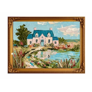 May include: An oil painting in a gold ornate frame depicting a light pink house with a blue roof situated beside a pond. The scene features thick, textured brushstrokes, green foliage, and a light blue sky with soft white clouds reflected in the water.