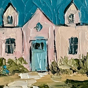 May include: An oil painting on canvas depicting a house with light pink walls, a dark teal roof, and a central blue door. The structure features two dormer windows, a light blue sky, and textured green foliage in the foreground with a path.