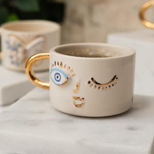 Handmade Winking Face Ceramic Mug With Gold-Plated Handle