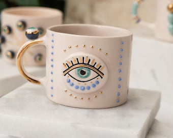 Handcrafted Ceramic Evil Eye Mug: 24 ct Gold Accents, Protector Mug