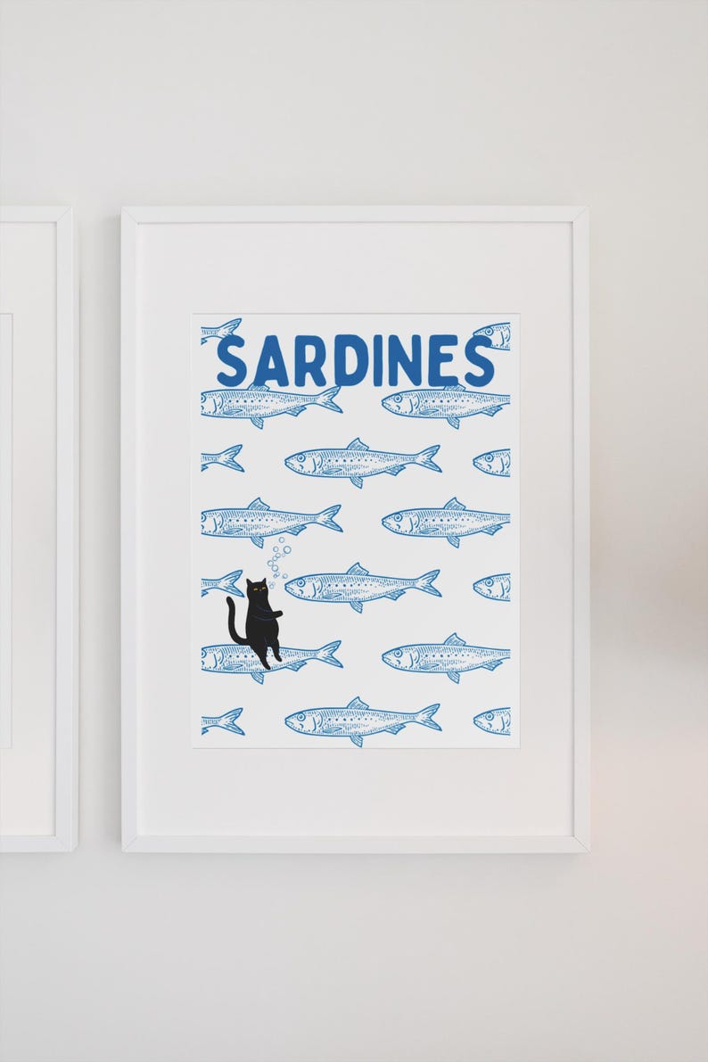 Featuring a retro-inspired blue sardine pattern on a crisp white background, this design stands out with a playful black cat floating among the fish, blowing bubbles. A perfect mix of vintage charm and quirky humor.