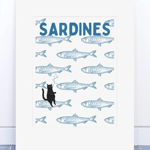 Featuring a retro-inspired blue sardine pattern on a crisp white background, this design stands out with a playful black cat floating among the fish, blowing bubbles. A perfect mix of vintage charm and quirky humor.