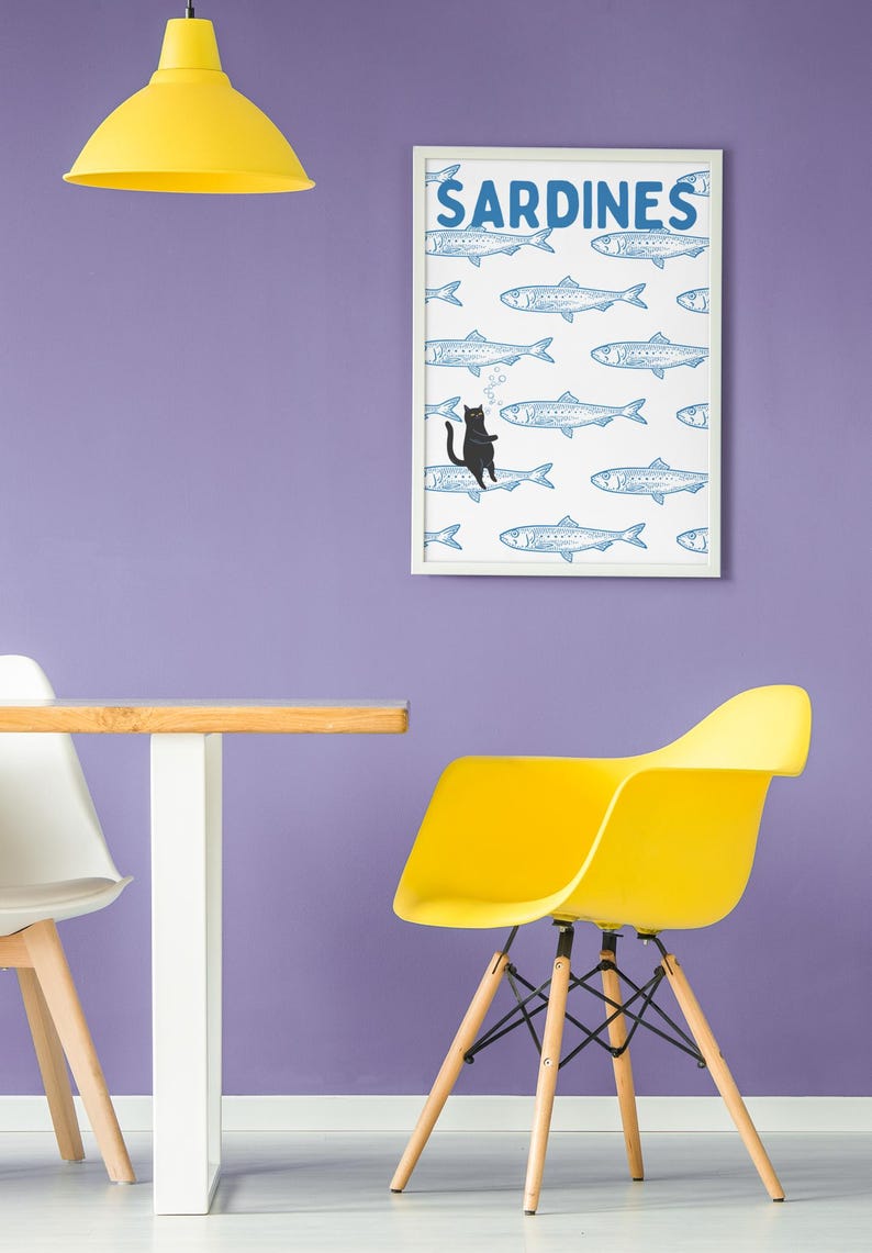 Featuring a retro-inspired blue sardine pattern on a crisp white background, this design stands out with a playful black cat floating among the fish, blowing bubbles. A perfect mix of vintage charm and quirky humor.