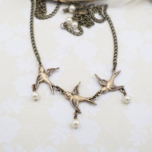 Handmade Brass Swallow Bird Necklace: Cream Pearls, Petite Jewelry