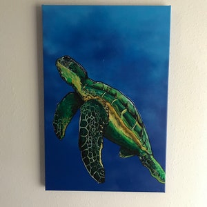 May include: A green sea turtle swimming in a blue ocean. The turtle is painted in a realistic style with detailed scales and a yellow stripe on its shell.
