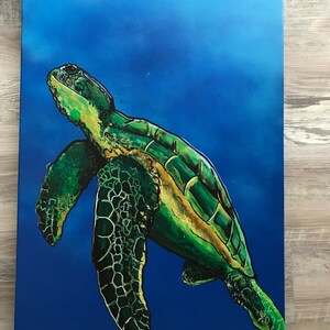 May include: A green sea turtle with yellow markings swims in a blue ocean. The turtle is painted in a realistic style with detailed scales and a textured shell.